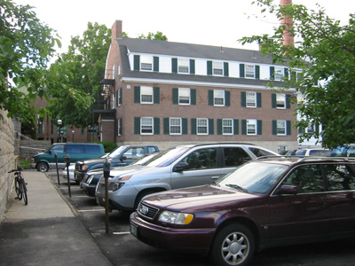 Brewster Hall and parking lot, site of Maffei Arts Plaza